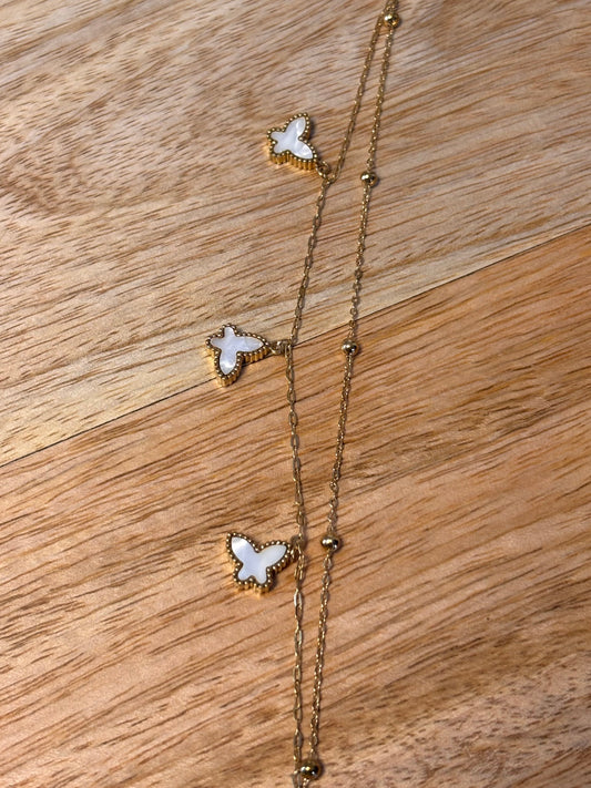 Bracelet chaîne doré papillons