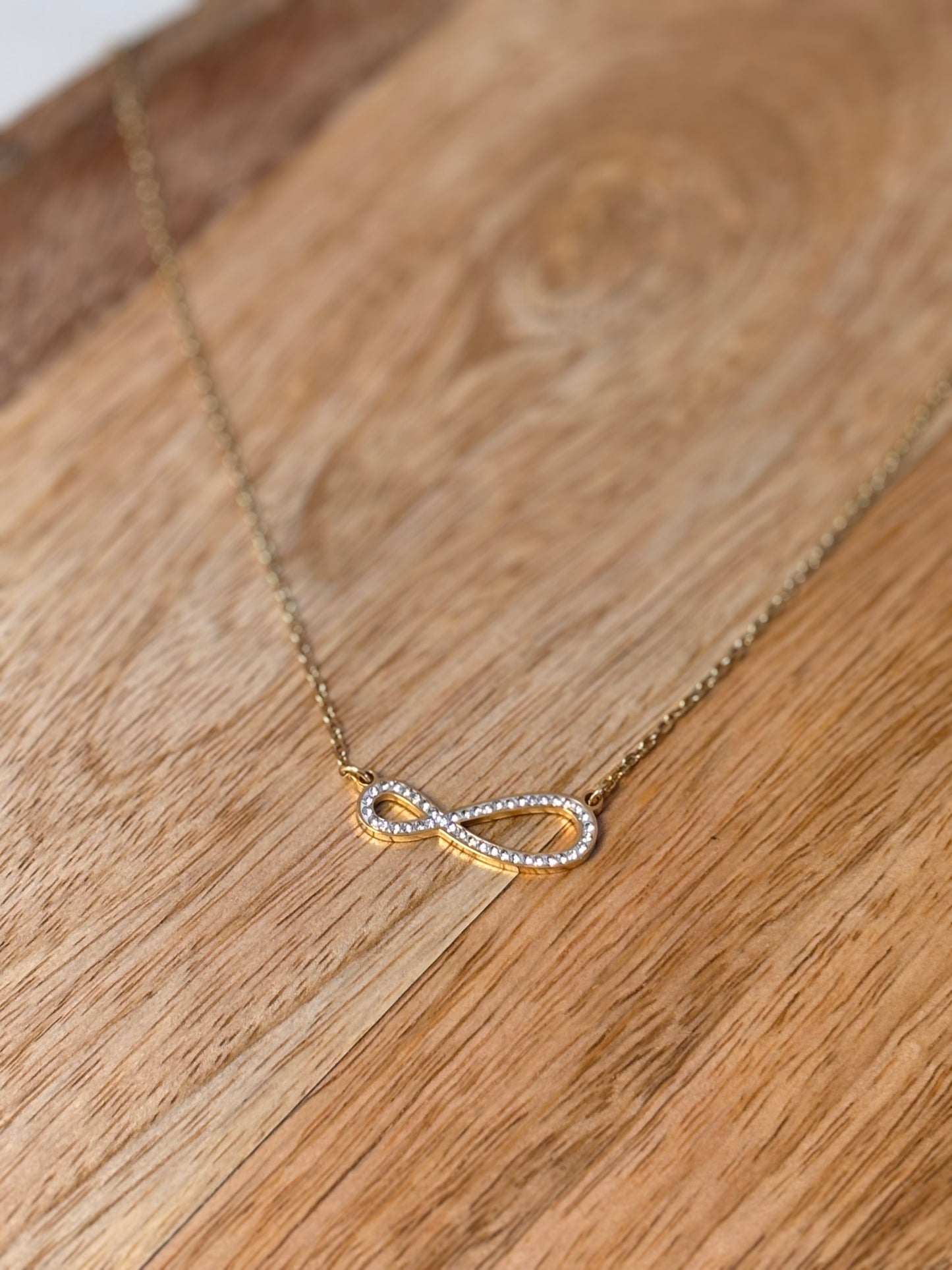 Golden infinity symbol necklace