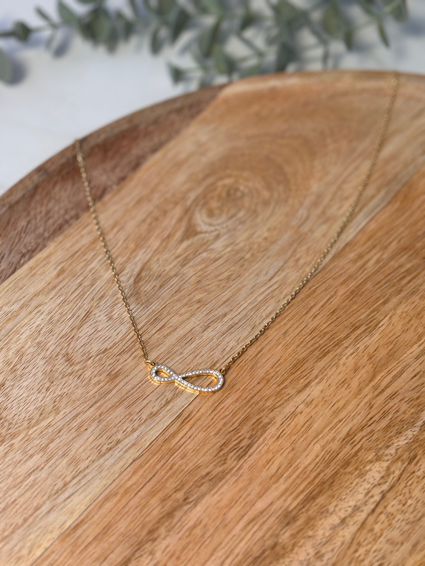 Golden infinity symbol necklace