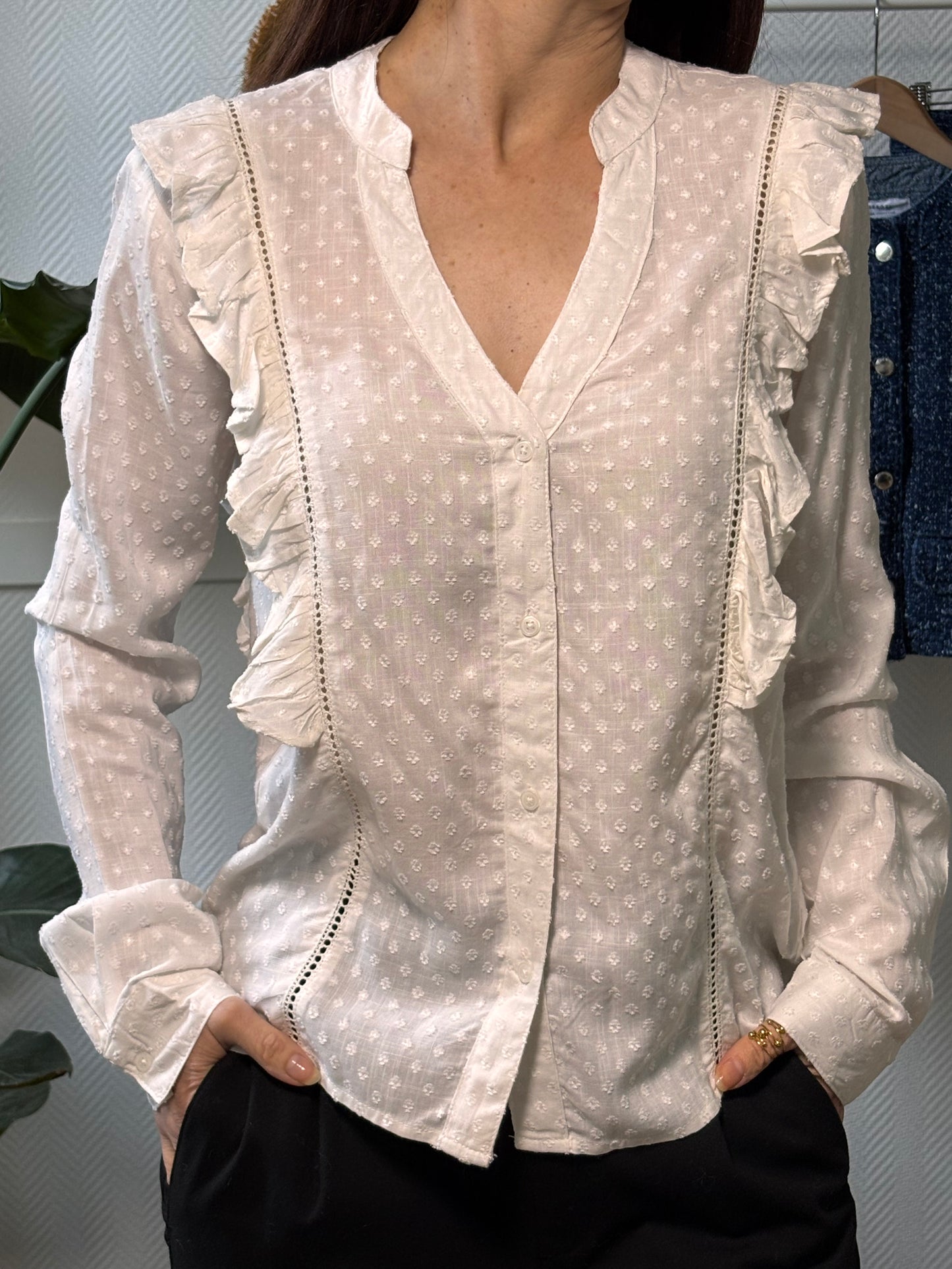 White ruffled blouse
